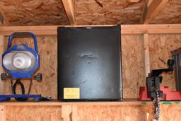 BLACK DORM STYLE REFRIGERATOR, LOCATED IN SHED