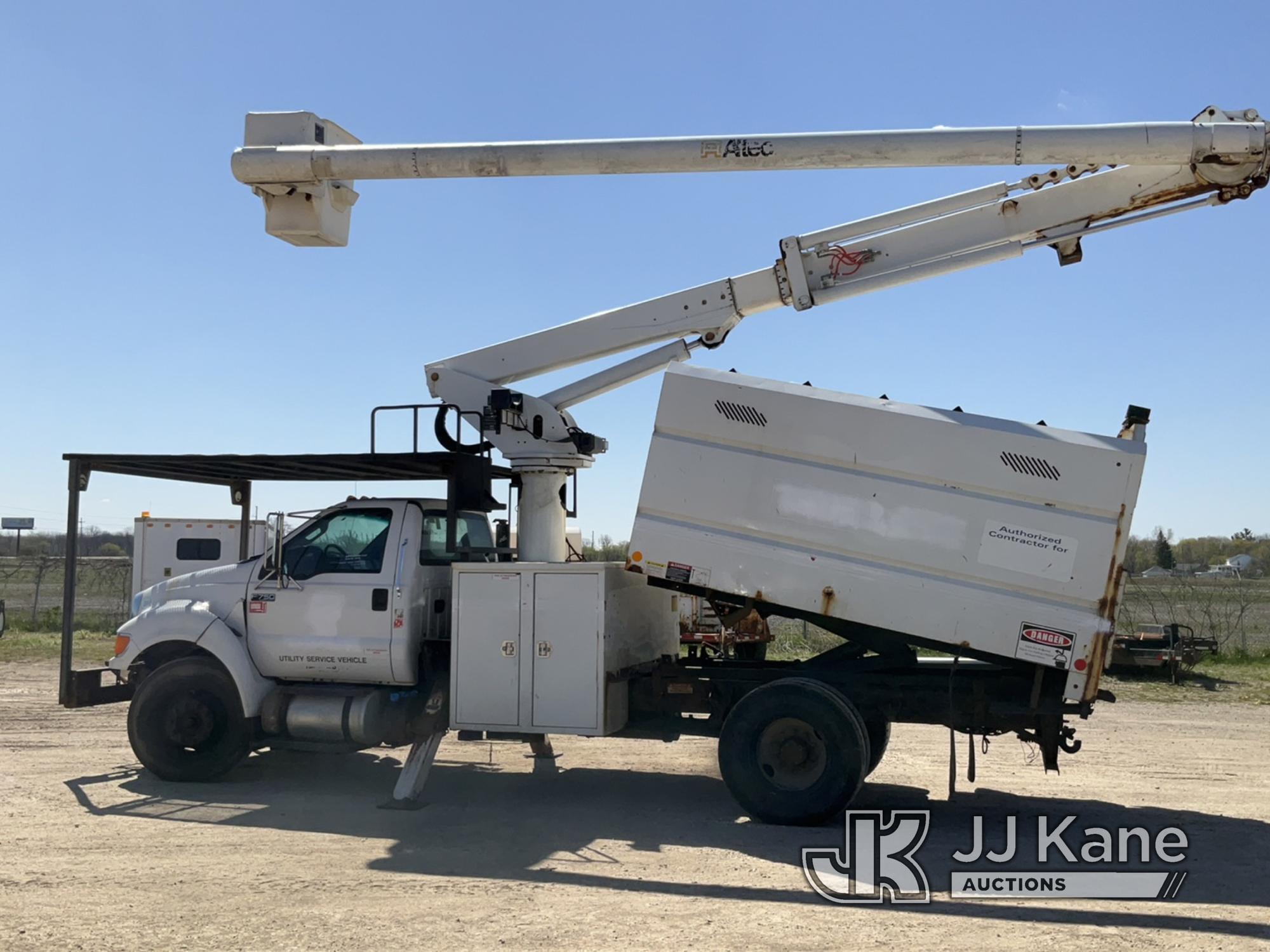 (Charlotte, MI) Altec LR756, Over-Center Bucket Truck mounted behind cab on 2012 Ford F750 Chipper D
