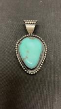 STERLING & TURQUOISE NATIVE AMERICAN PENDANT. 29G