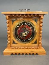 U.S.M.C. clock in wood frame