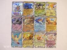 Twelve Foil "EX" Pokemon Cards including Pidgeot ex, Zapdos ex, Greedent ex, Clefable ex, Houndstone