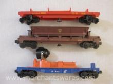 Three Lionel Train Cars CR9312 Search Light, Pennsylvania 9398 Mechanical Dump Car, and ATSF 9310