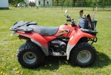 Kawasaki Prairie Automatic 300 4-Wheeler, 4x4, shows 5,874 miles, runs & drives, stored inside.