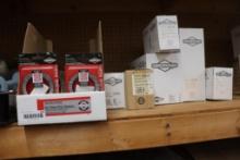 LARGE QUANTITY OF BRIGGS AND STRATTON PARTS