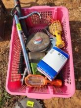 plastic tub with staplers wire, strippers filters, scissors, tape measures lights, and other tools