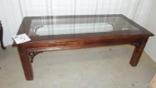 coffee table, wood with glass top 17in tall and 50in long