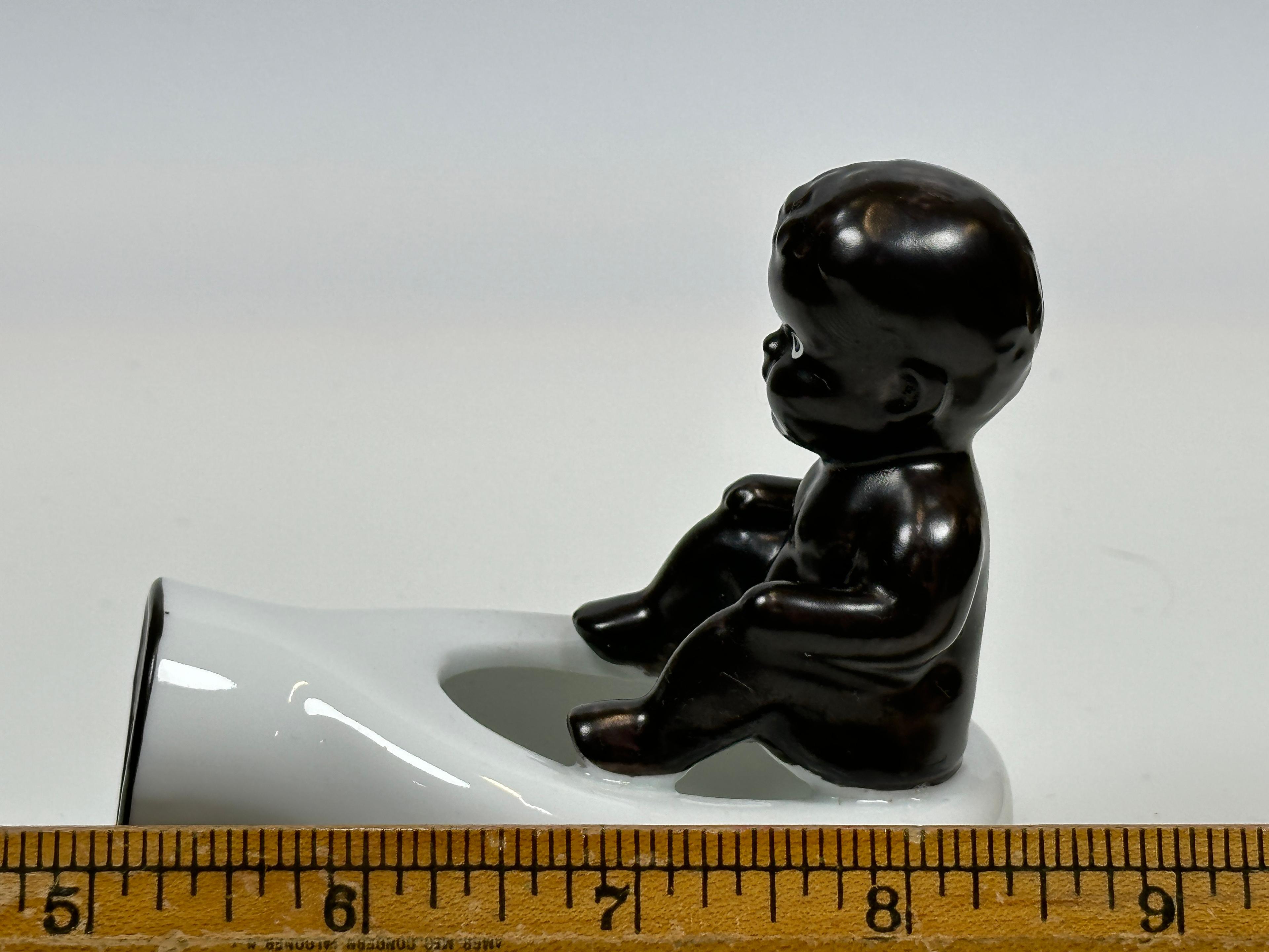 Black Americana Baby on Bed Pan (Occupied Japan)