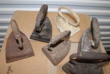 Six Antique Cast Irons