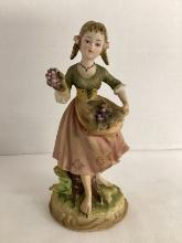 Girl with Grapes Porcelain Figurine