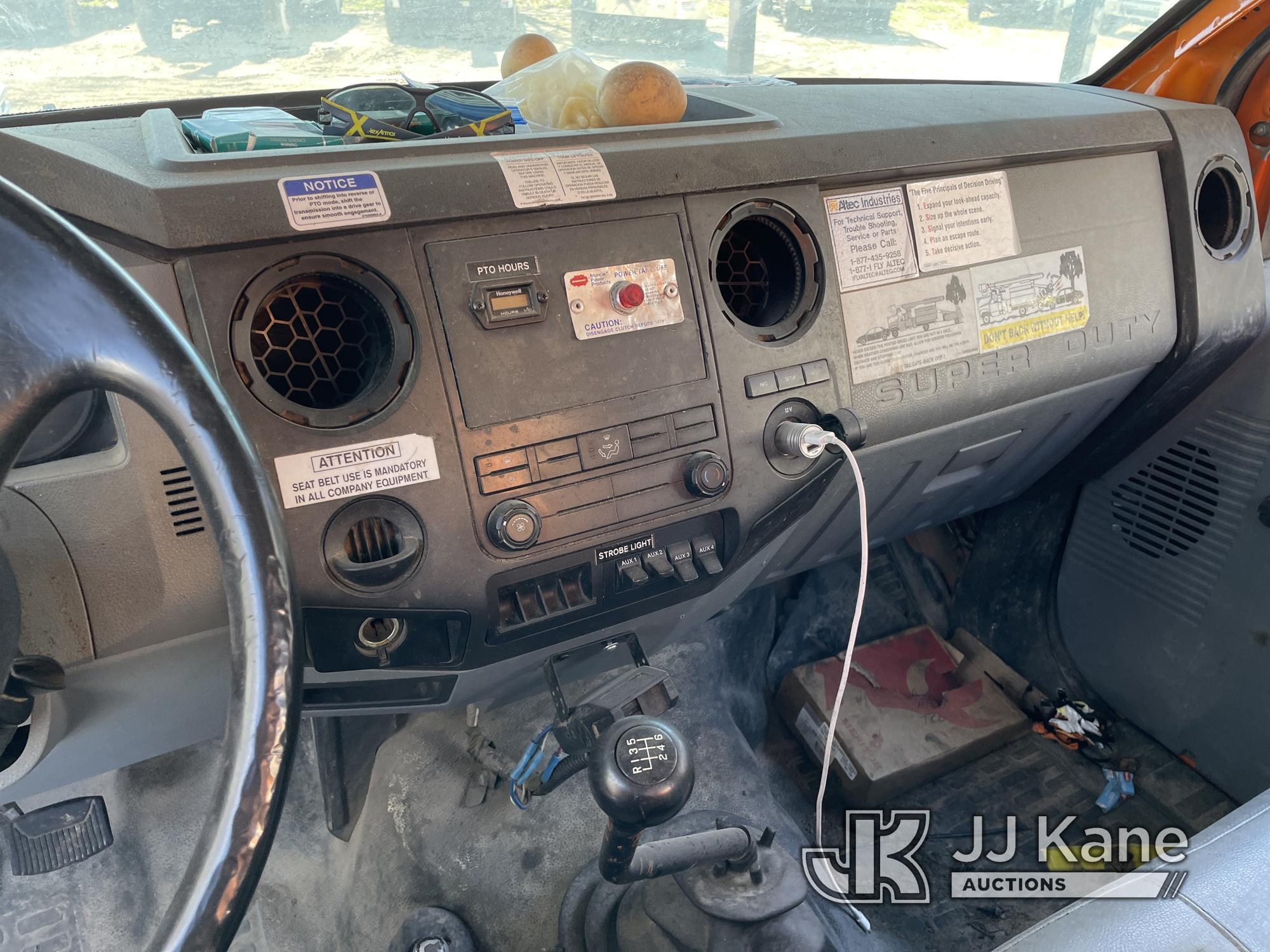 (Kansas City, MO) Altec LR756, Over-Center Bucket Truck mounted behind cab on 2013 Ford F750 Chipper