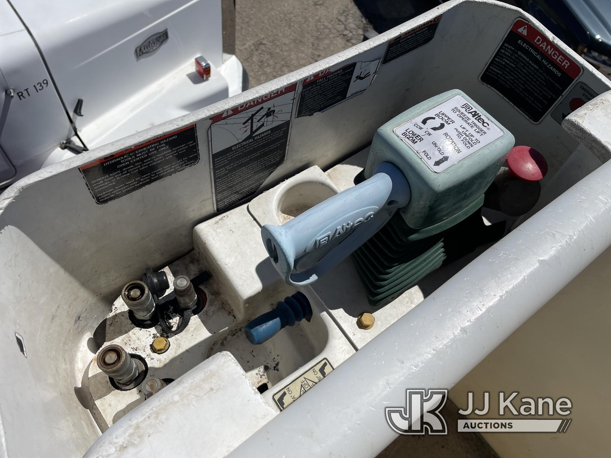 (Kansas City, MO) Altec LR756, Over-Center Bucket Truck mounted behind cab on 2013 Ford F750 Chipper