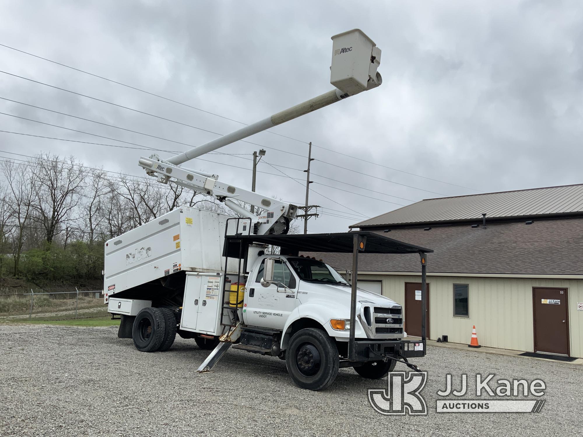 (Fort Wayne, IN) Altec LR756, Over-Center Bucket Truck mounted behind cab on 2015 Ford F750 Chipper