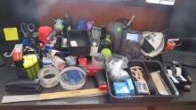 mixed office desk supplies and telephone