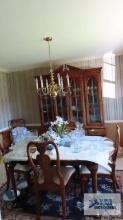 American Drew dining table with 2 leaves, 6 chairs, and breakfront. Located in dining room. Please