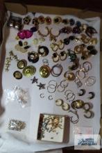 Assorted pierced earrings.