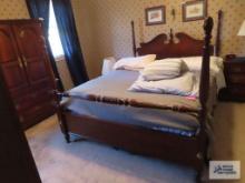 Queen size pineapple motif poster bed and Broyhill nightstand.