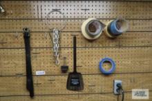 small plastic hardware bin and razor blades, ashtray, tape, hand saws and etc
