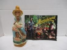 1969 Old Cabin Still Whiskey Decanter and  "Moonshiners" Signed "J B Rader" Photo