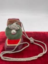 Stunning vintage Nephrite Jade disc pendant with floral motif on sterling silver chain