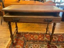 Vintage one drawer table on casters. 29"T x 36"W x 19"D