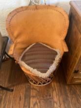 Vintage, leather Equipale barrel back chair. 37"T x 23.5 "W