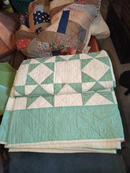 (BR1) LOT OF 2 HAND MADE QUILTS, 1 IS SCRAP PATCHWORK, THE OTHER US UNIFORM GREEN AND WHITE DIAMONDS