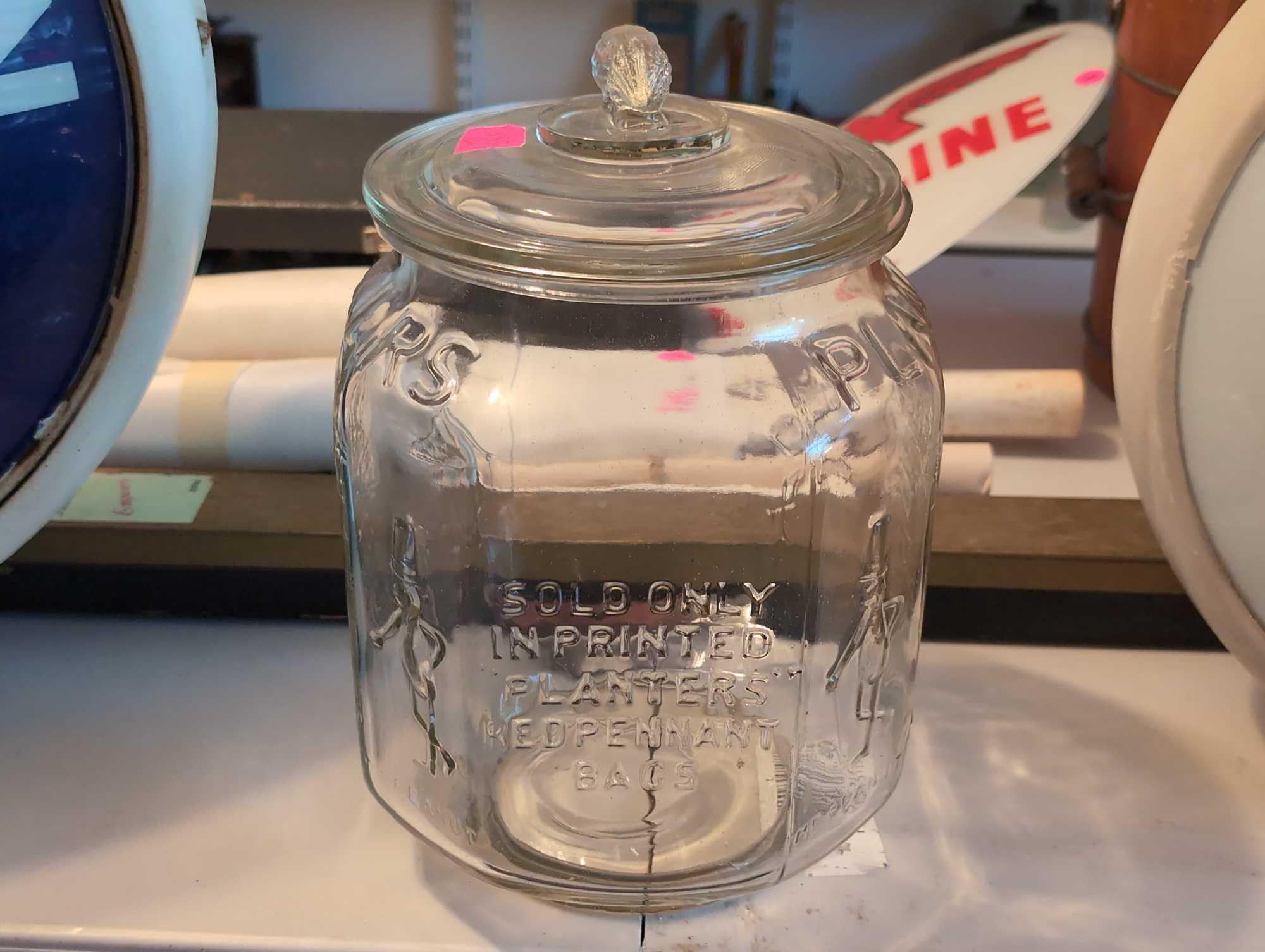 (BR2) VINTAGE CLEAR GLASS PLANTERS PEANUTS PENNANT 5 CENT PEANUTS JAR WITH LID. MEASURES 7-1/2" X