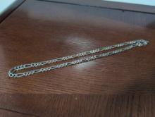 (BR1) .925 STERLING SILVER FIGARO CHAIN WITH LOBSTER CLASP, MADE IN ITALY. IT MEASURES 22" LONG AND