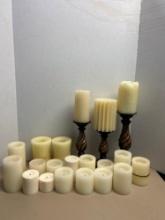 3 candles holders and miscellaneous candles