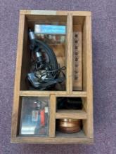 Vintage microscope and accessories in woodcase