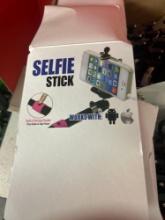 5 boxes of selfie sticks