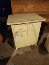 Cabinet with Porcelain Top - Located in Walkout Basement Bring help to load